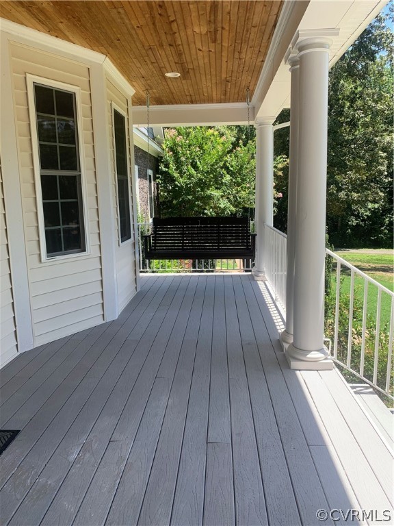 20710 River Road Chesterfield, VA 23838 - Photo 23 of 24 a view of balcony with floor to ceiling window and wooden floor