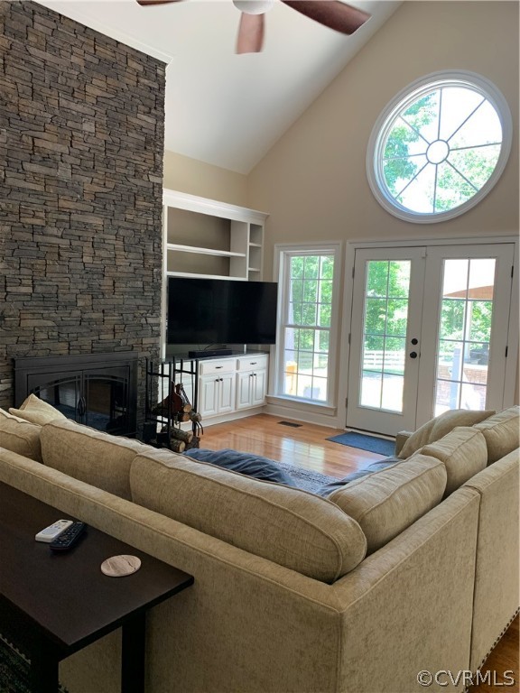 20710 River Road Chesterfield, VA 23838 - Photo 4 of 24 a living room with fireplace furniture and a flat screen tv