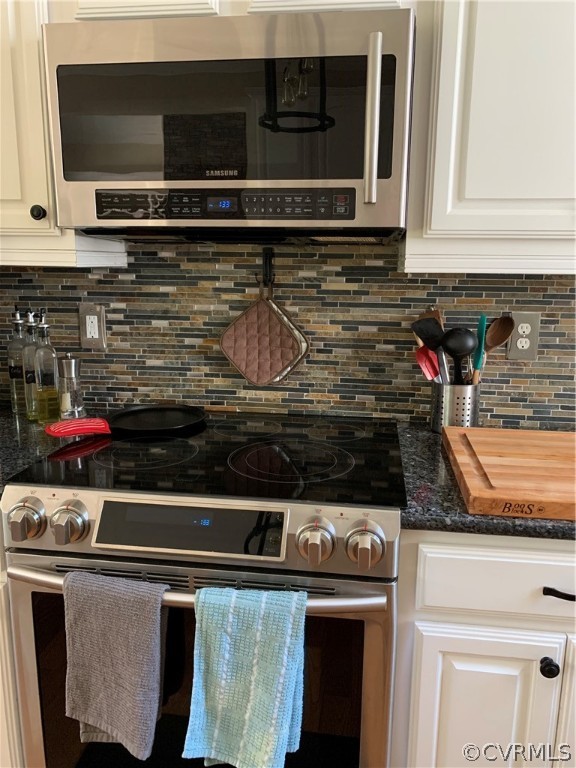 20710 River Road Chesterfield, VA 23838 - Photo 7 of 24 a kitchen with a stove and a microwave