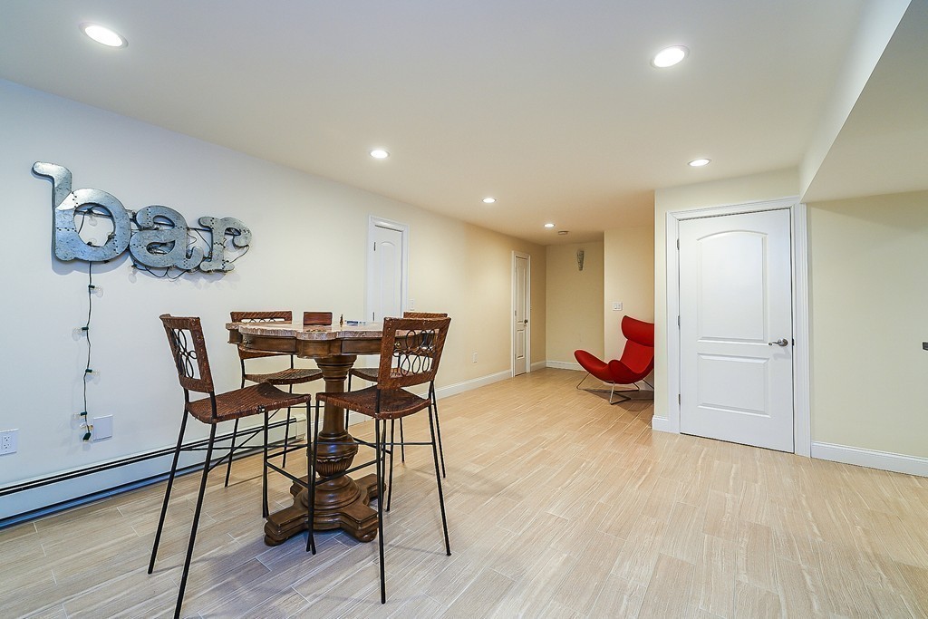 17 Drew Road Newton, MA 02467 - Photo 18 of 22 a view of a room with furniture and wooden floor