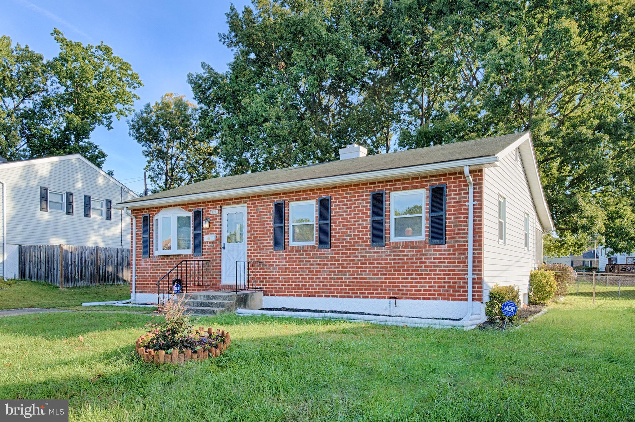 529 Crisfield Road Baltimore, MD 21220 - Photo 1 of 19 a backyard of a house with table and chairs