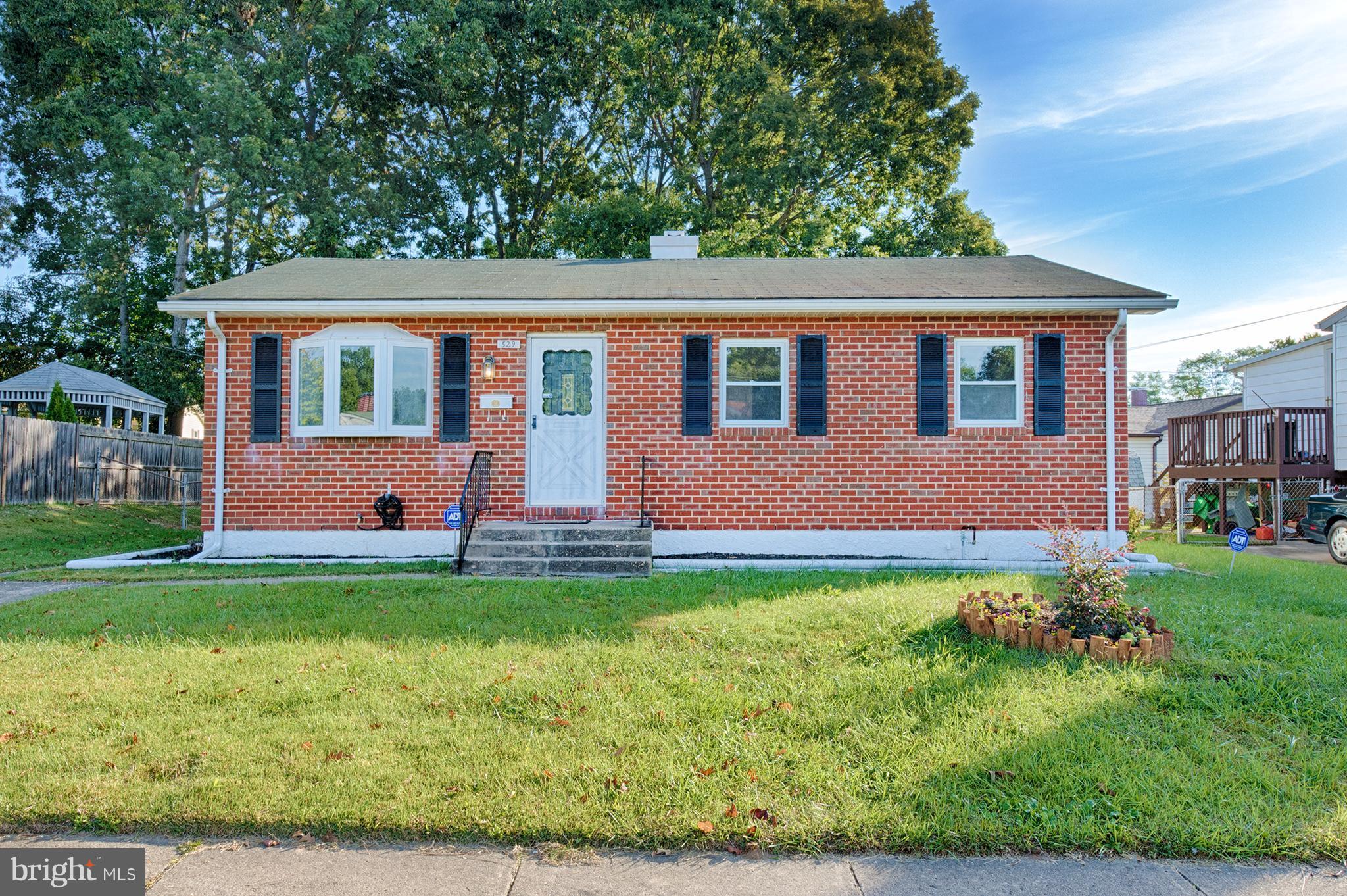 529 Crisfield Road Baltimore, MD 21220 - Photo 2 of 19 a front view of a house with a yard
