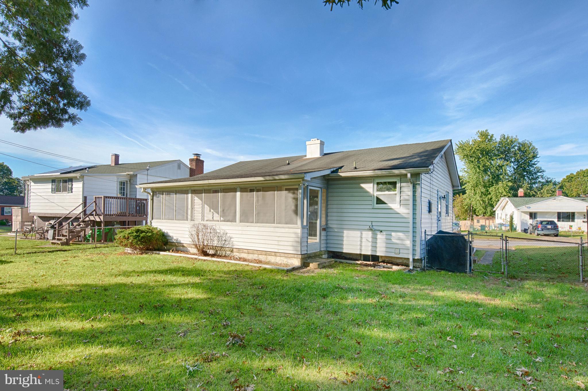529 Crisfield Road Baltimore, MD 21220 - Photo 15 of 19 a front view of house with yard and green space
