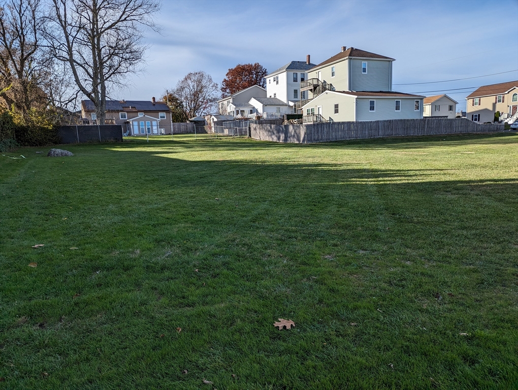 191 Glasgow Street, Unit 3 Fall River, MA 02721 - Photo 14 of 16 a front view of a house with garden