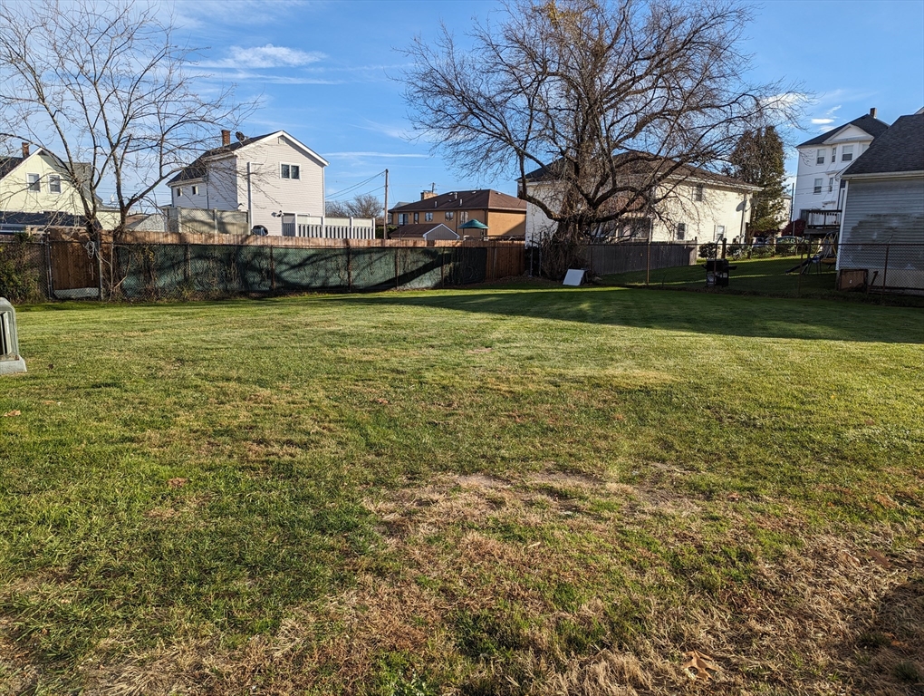 191 Glasgow Street, Unit 3 Fall River, MA 02721 - Photo 15 of 16 a front view of a house with a yard