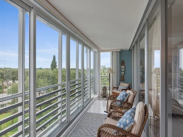 a room with furniture and windows