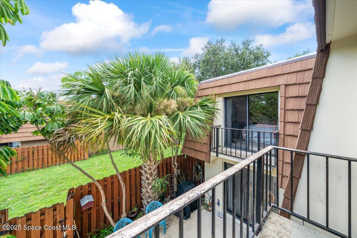 1713 Patty Circle Northeast Palm Bay, FL 32905 - Photo 23 of 26 a view of a house with a yard