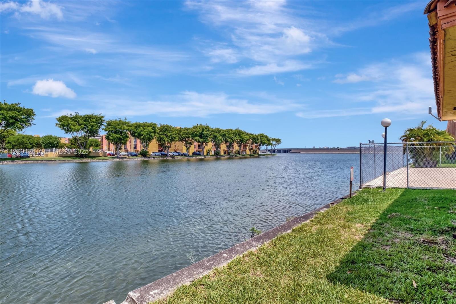4801 Northwest 7th Street, Unit 21016 Miami, FL 33126 - Photo 14 of 18 a view of a lake