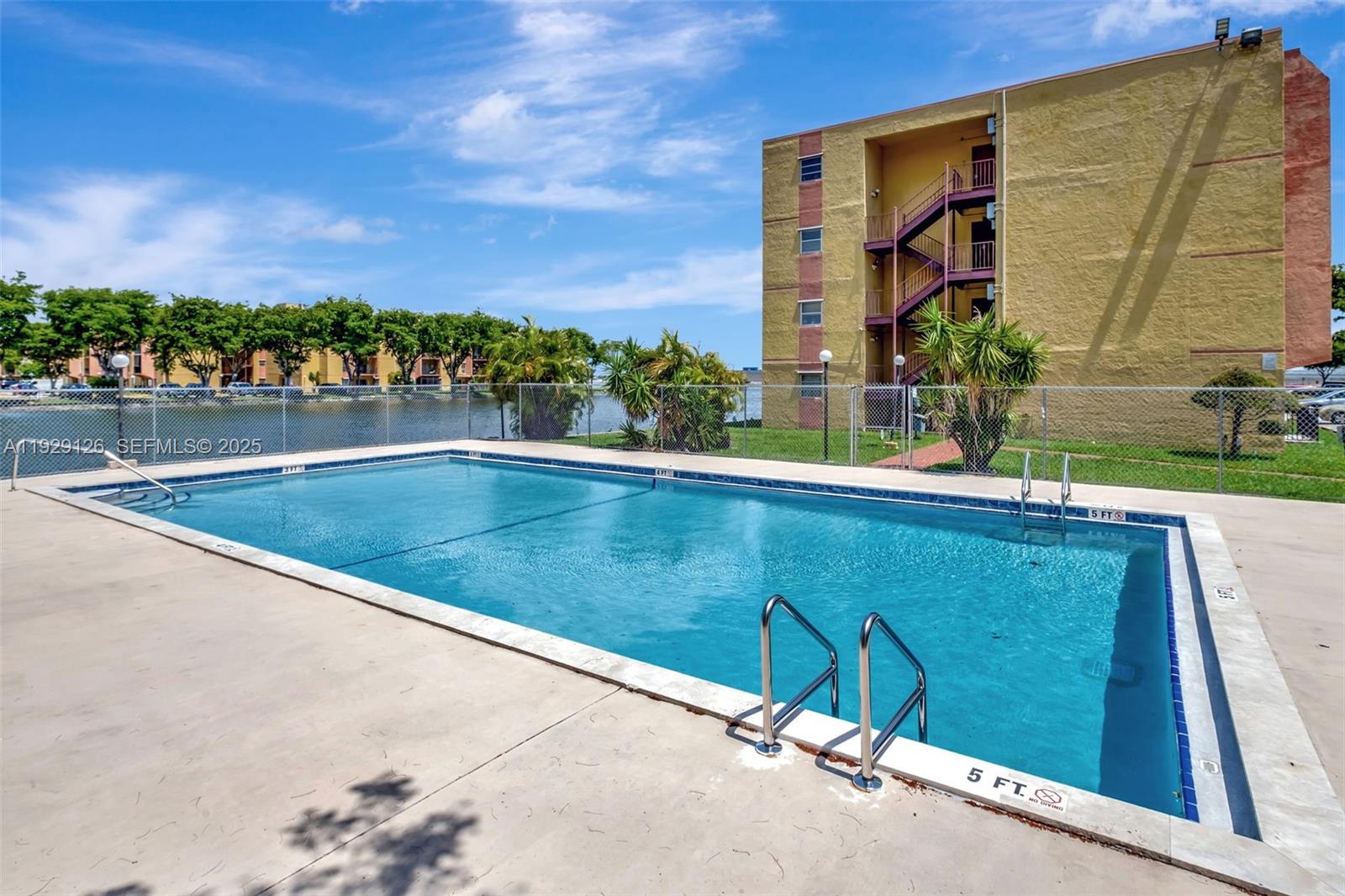 4801 Northwest 7th Street, Unit 21016 Miami, FL 33126 - Photo 16 of 18 a view of swimming pool
