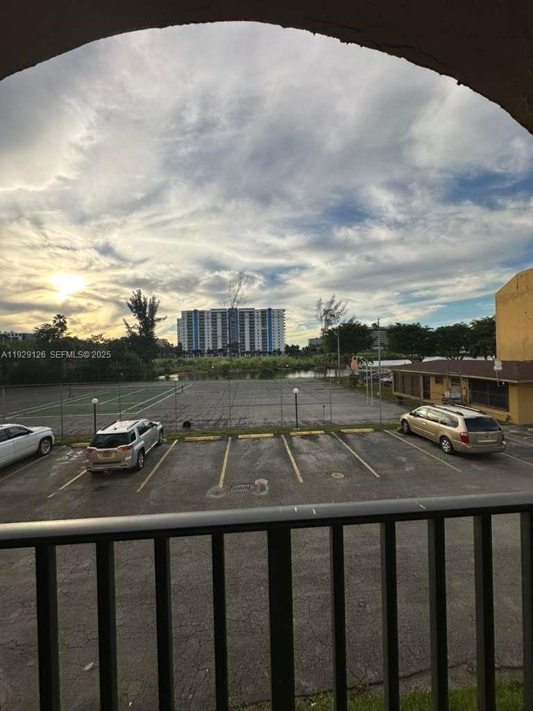 4801 Northwest 7th Street, Unit 21016 Miami, FL 33126 - Photo 3 of 18 a view of a balcony with city view