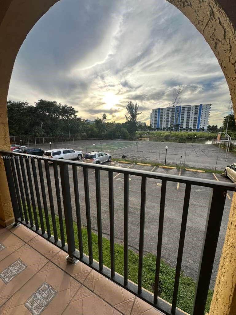 4801 Northwest 7th Street, Unit 21016 Miami, FL 33126 - Photo 4 of 18 a view of a street view from a balcony