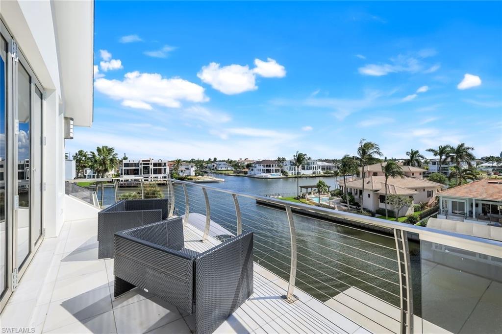 260 Channel Drive Naples, FL 34108 - Photo 22 of 48 a view of a terrace with sky view