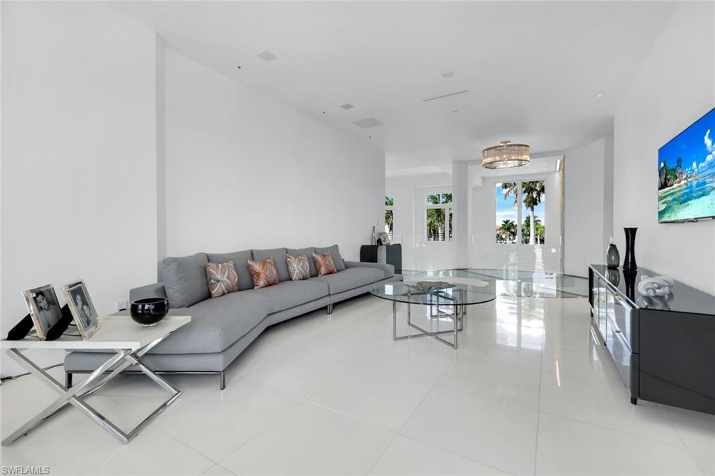 260 Channel Drive Naples, FL 34108 - Photo 23 of 48 a living room with furniture and wooden floor