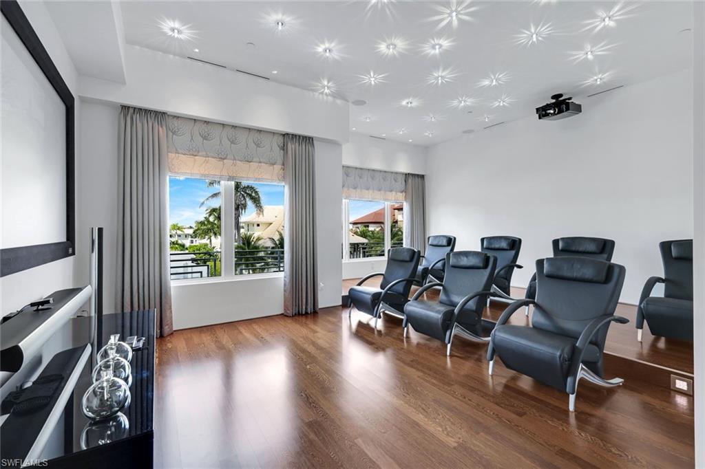 260 Channel Drive Naples, FL 34108 - Photo 32 of 48 a living room with furniture and a wooden floor