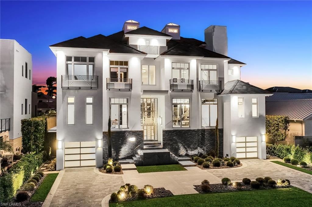 260 Channel Drive Naples, FL 34108 - Photo 45 of 48 a front view of a house with yard