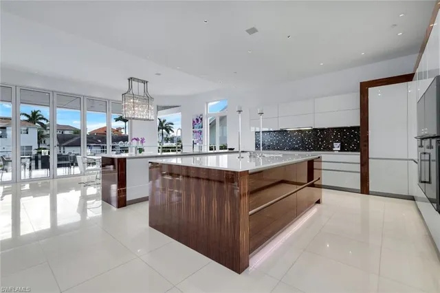 a view of kitchen with microwave and cabinets