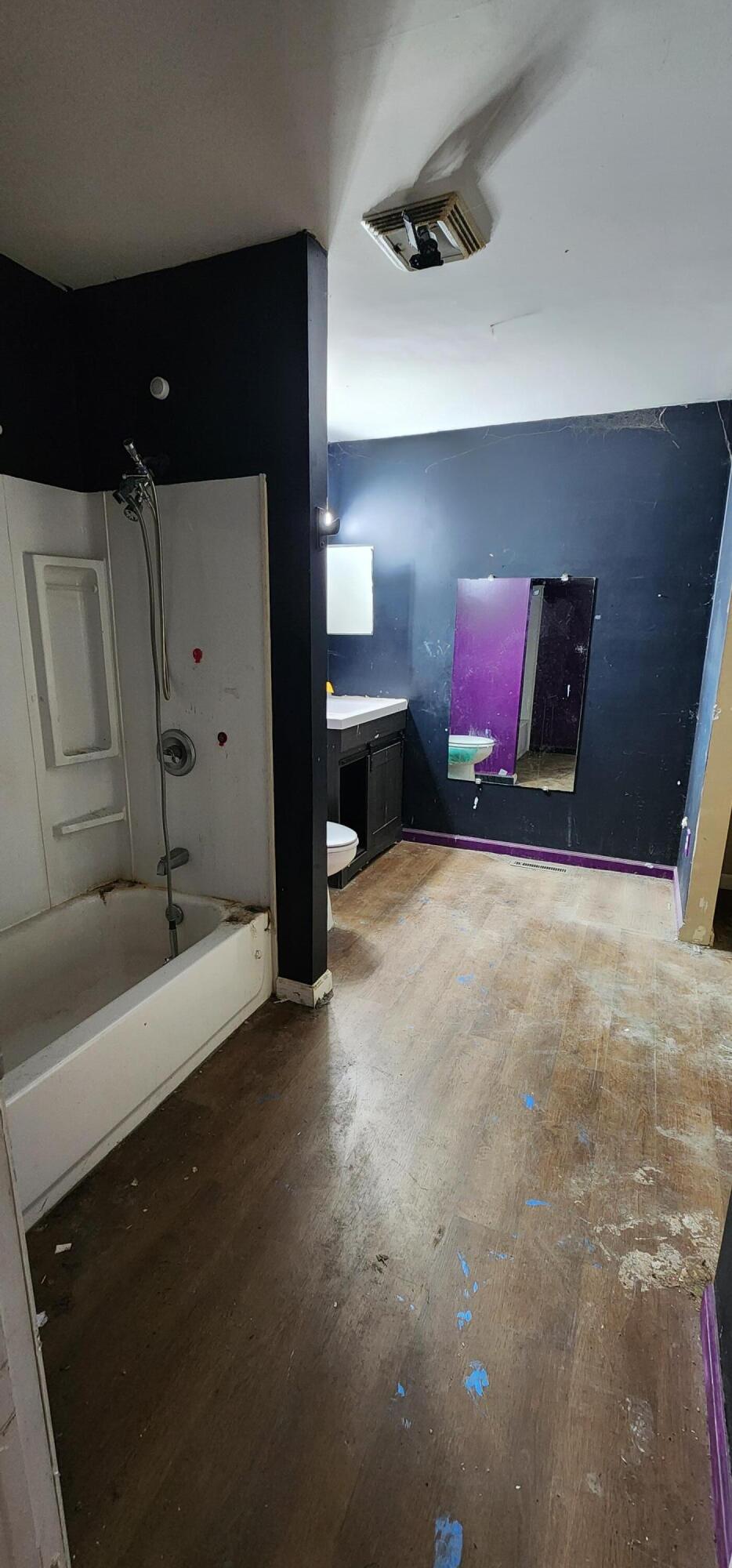 630 East Elm Street Rensselaer, IN 47978 - Photo 9 of 14 a bedroom with a bed and a walk in closet