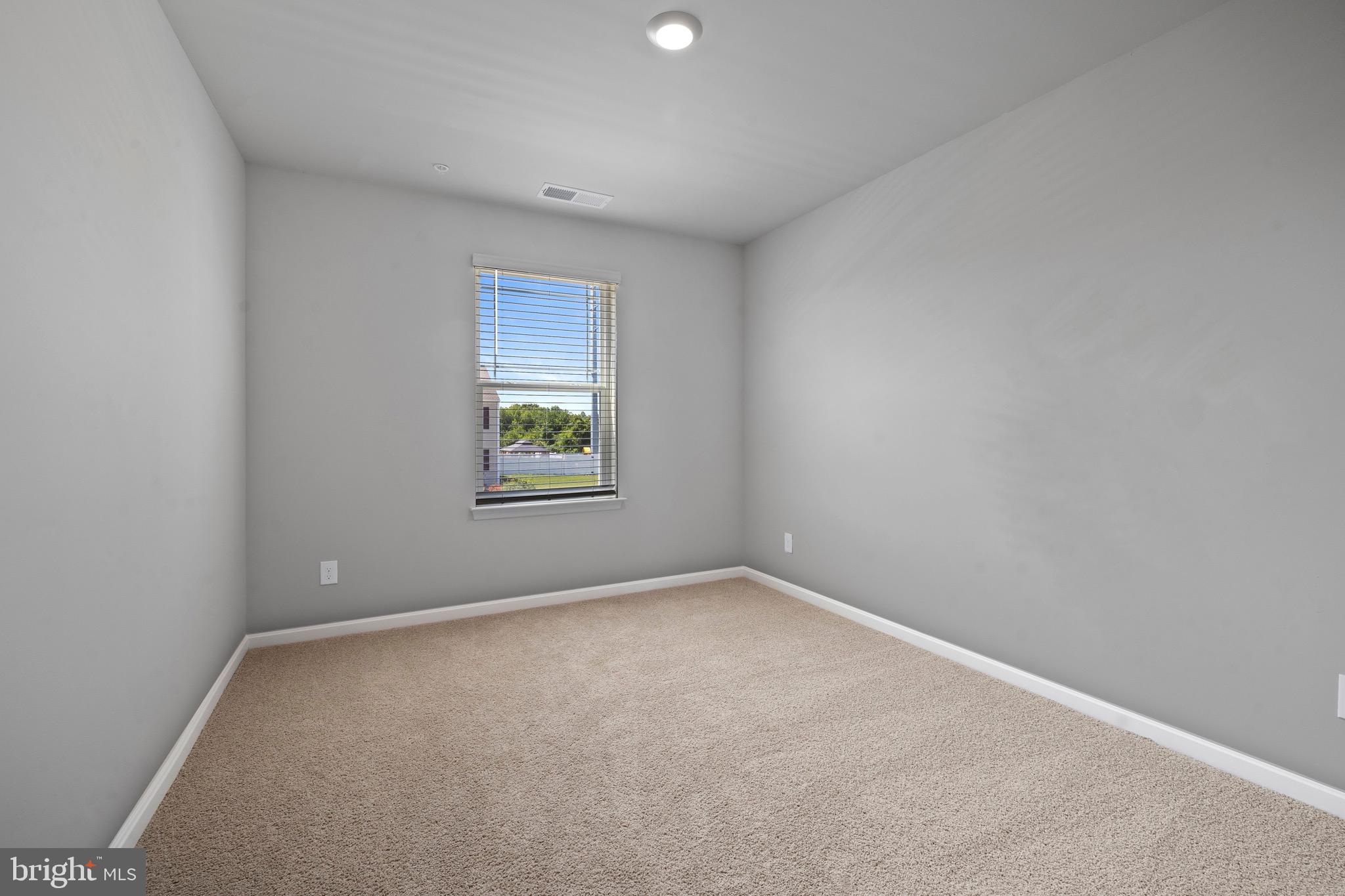 1638 Terrapin Circle Cambridge, MD 21613 - Photo 14 of 25 an empty room with windows