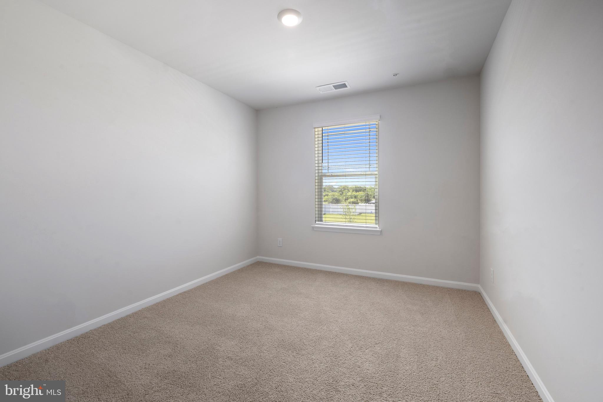 1638 Terrapin Circle Cambridge, MD 21613 - Photo 18 of 25 an empty room with a window