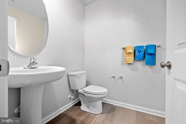 1638 Terrapin Circle Cambridge, MD 21613 - Photo 2 of 25 a bathroom with a sink and a toilet
