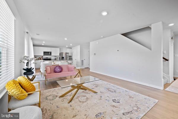 1638 Terrapin Circle Cambridge, MD 21613 - Photo 6 of 25 a living room with furniture and a rug