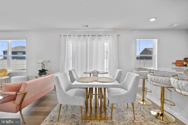 1638 Terrapin Circle Cambridge, MD 21613 - Photo 9 of 25 a view of a dining room with furniture window and outside view