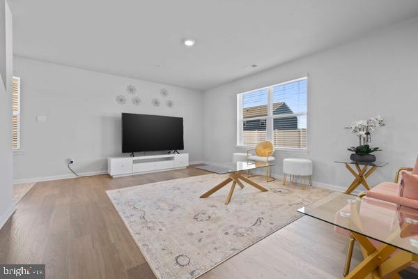 1638 Terrapin Circle Cambridge, MD 21613 - Photo 10 of 25 a living room with furniture and a flat screen tv