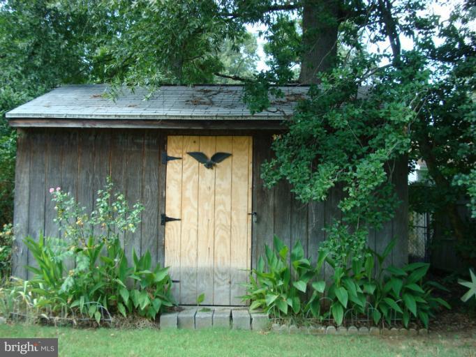 1627 Bay Ridge Road Edgewater, MD 21037 - Photo 16 of 21 a view of a wooden door of the house