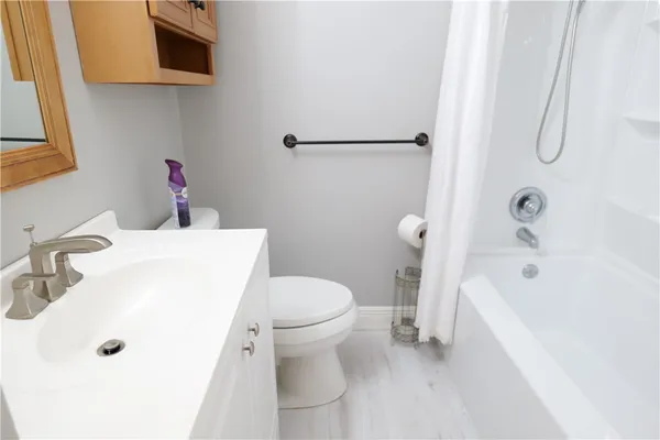 a view of a house with backyard and porch