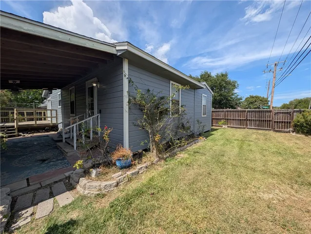 a house view with a backyard