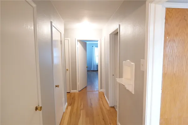 a kitchen with a sink and a stove top oven