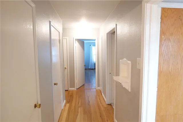 a kitchen with a sink and a stove top oven