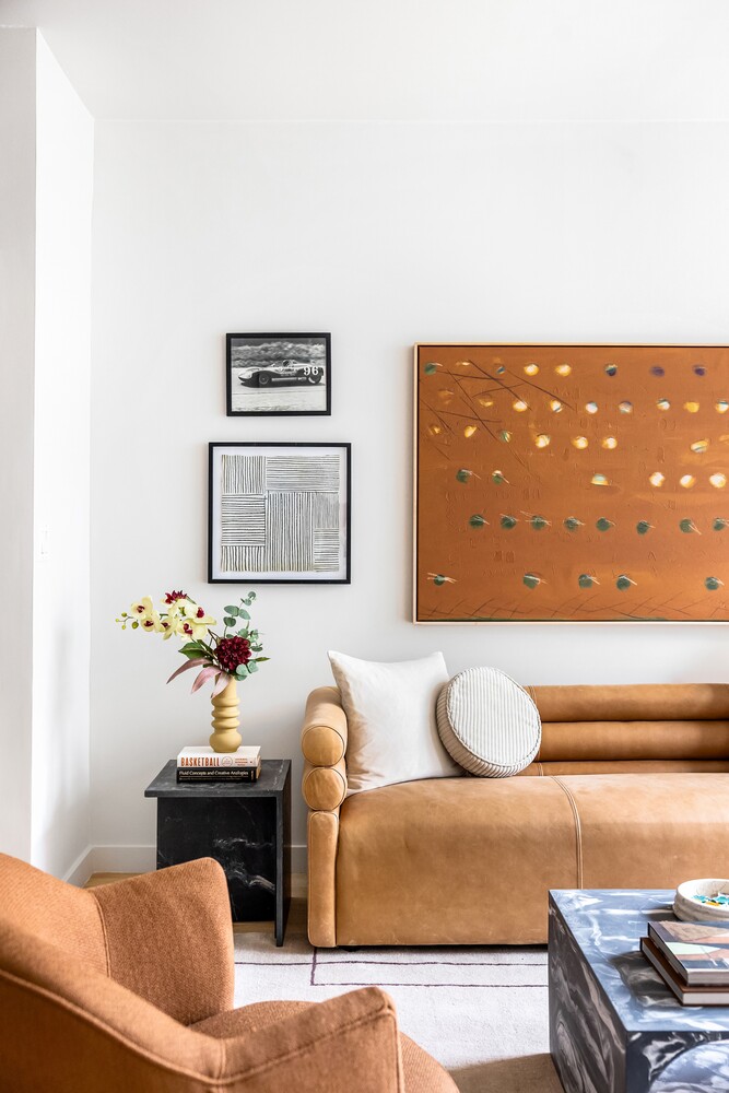 425 East 13th Street, Unit 2B Manhattan, NY 10009 - Photo 2 of 17 a living room with furniture and wooden floor
