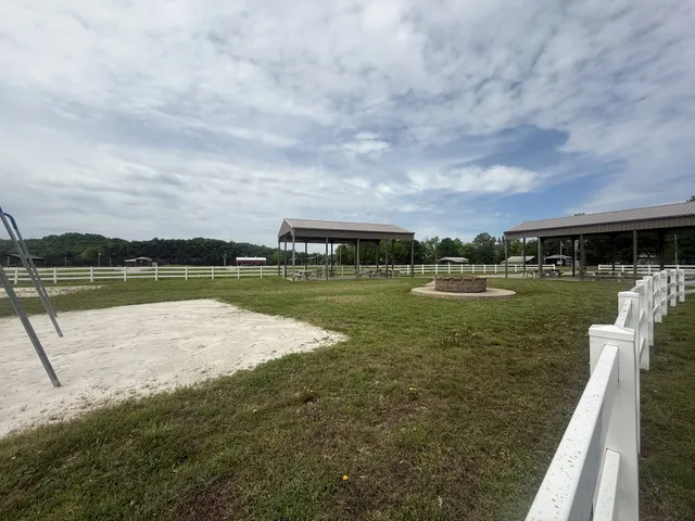 a view of a lake with houses in the background