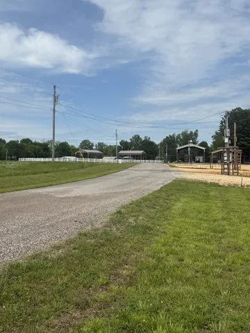 a view of a golf course with a lake