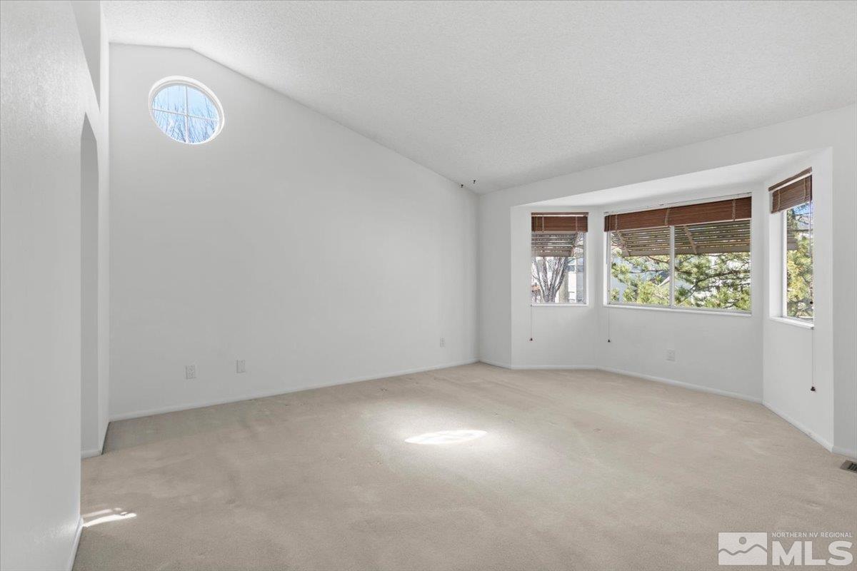 989 Ridgeview Drive Reno, NV 89511 - Photo 14 of 20 an empty room with windows