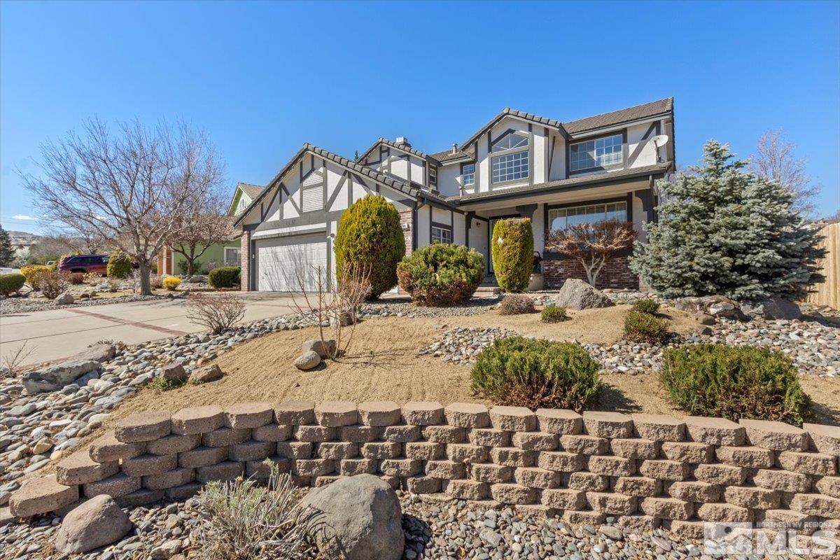 989 Ridgeview Drive Reno, NV 89511 - Photo 20 of 20 a front view of a house with a yard