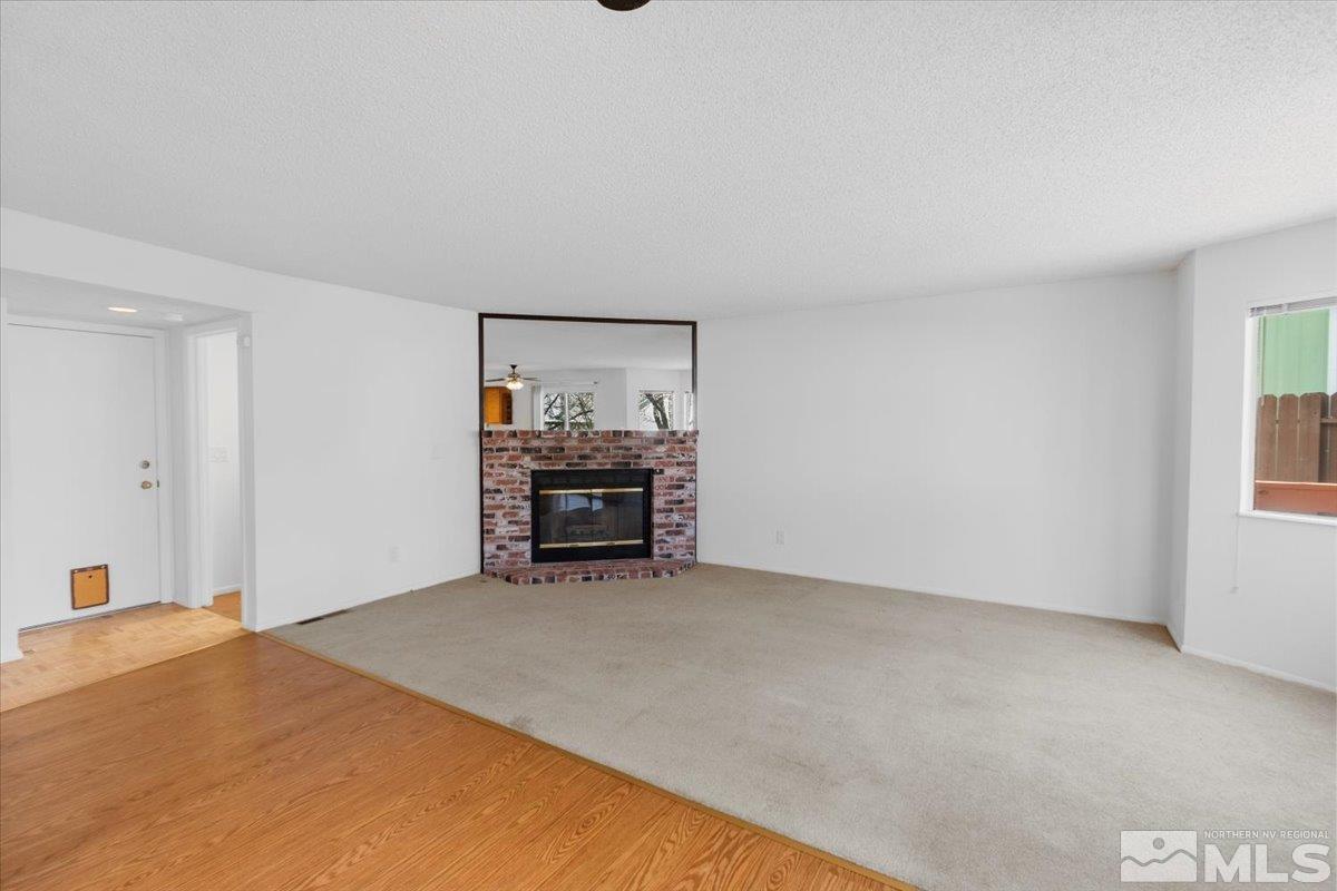 989 Ridgeview Drive Reno, NV 89511 - Photo 9 of 20 a room with a bed and a window