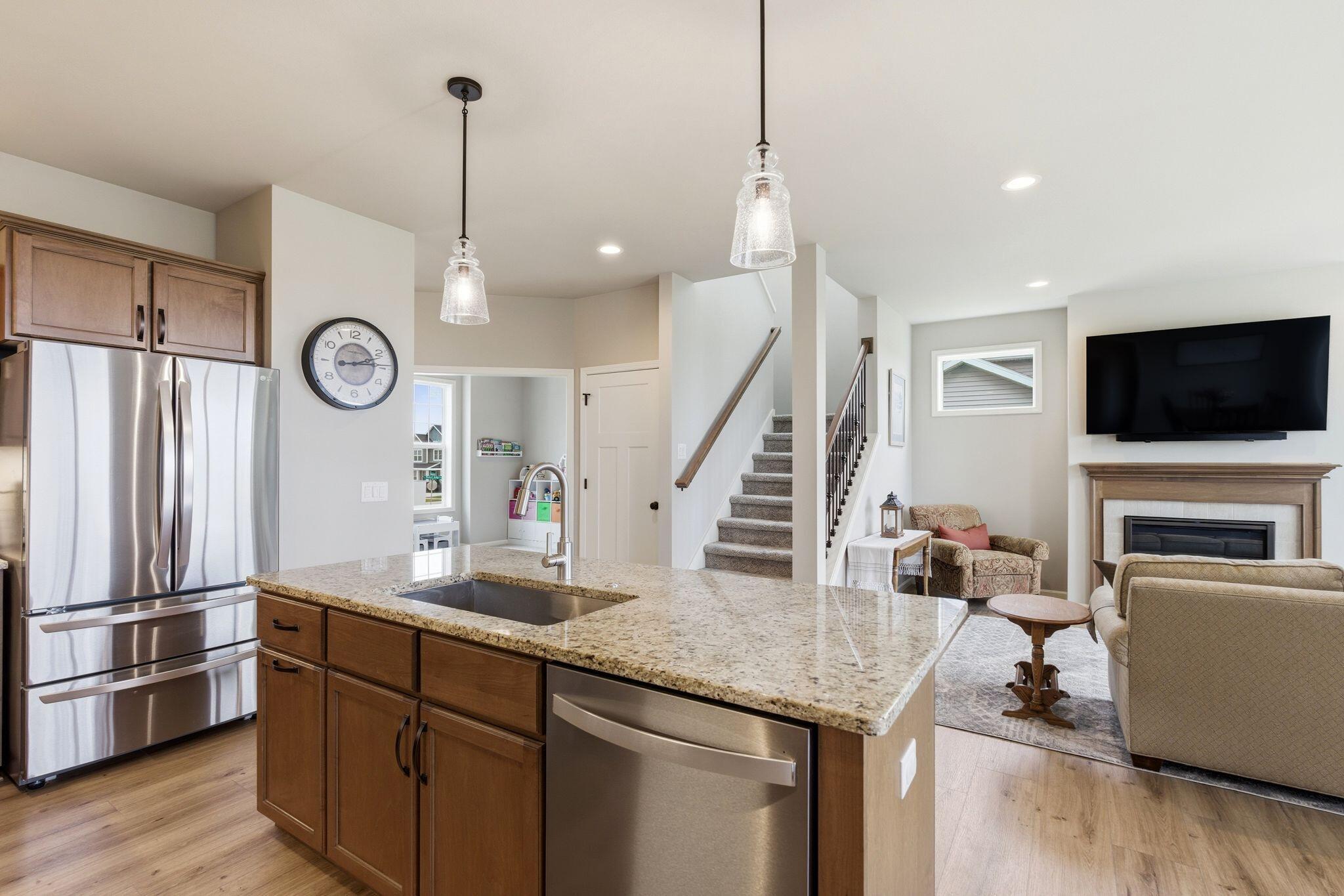 809 South Musket Ridge Drive Sun Prairie, WI 53590 - Photo 9 of 37 Kitchen overlooking Great room