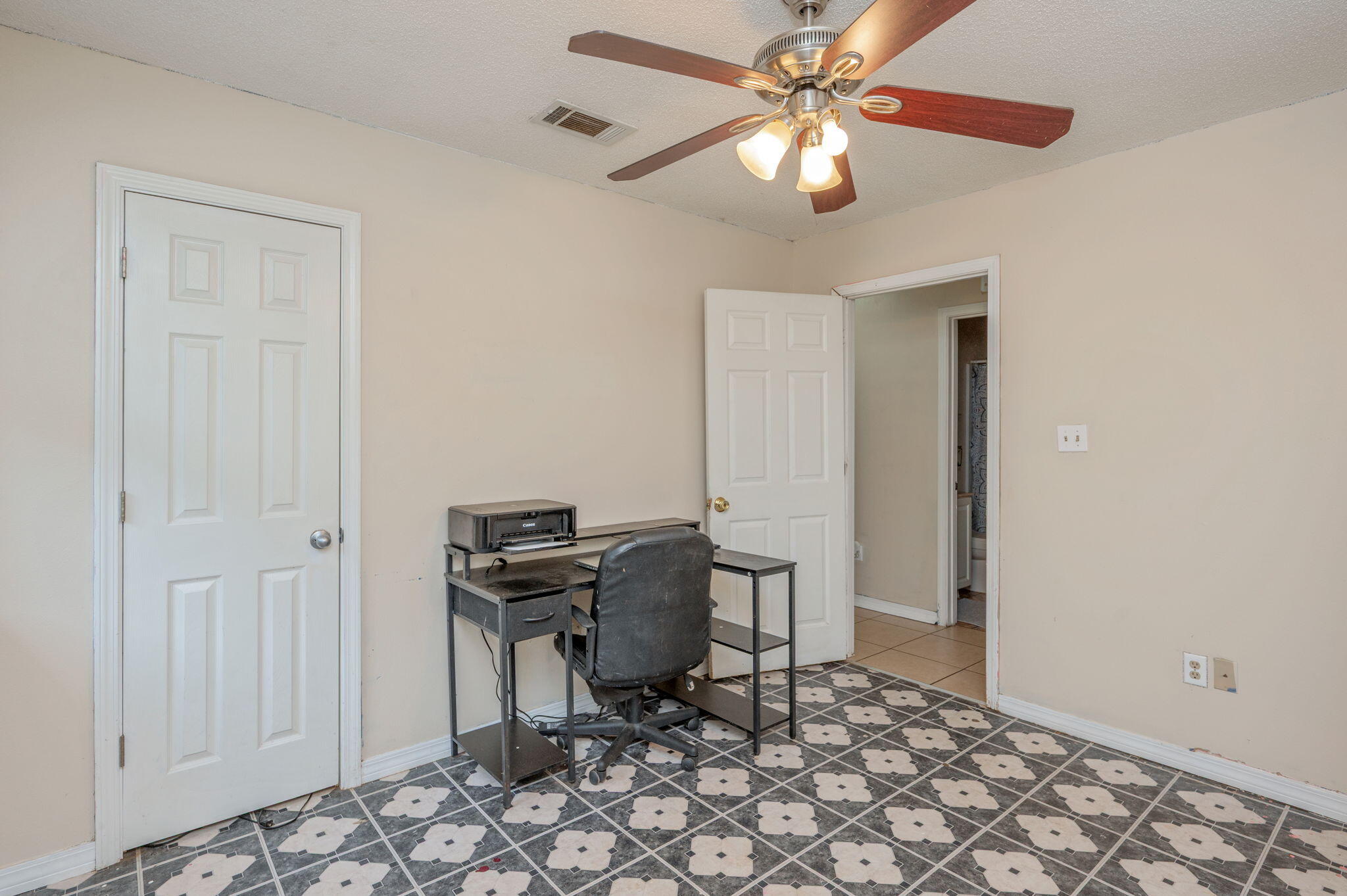 834 McDonald Street Crestview, FL 32536 - Photo 22 of 35 a view of a workspace with furniture