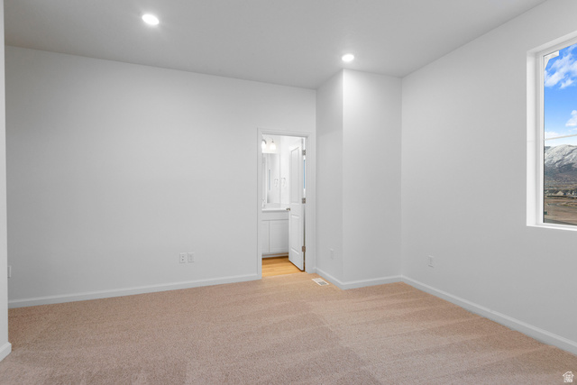 1302 East 1670th North, Unit 908 Payson, UT 84651 - Photo 15 of 21 Unfurnished bedroom with light carpet, recessed lighting, and connected bathroom
