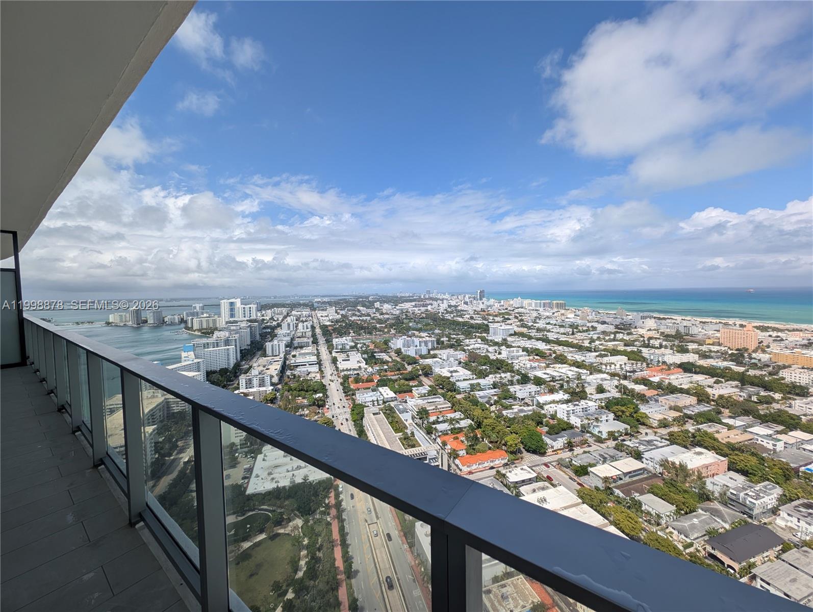 500 Alton Road, Unit 3905 Miami Beach, FL 33139 - Photo 20 of 27 a view of a city from a balcony