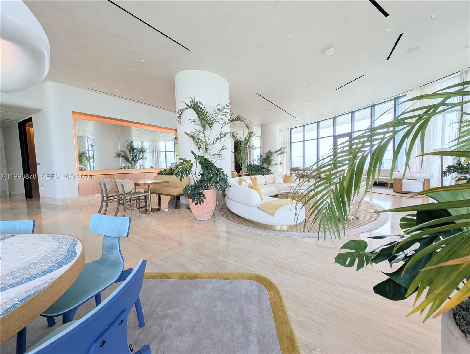 500 Alton Road, Unit 3905 Miami Beach, FL 33139 - Photo 22 of 27 a living room with patio furniture
