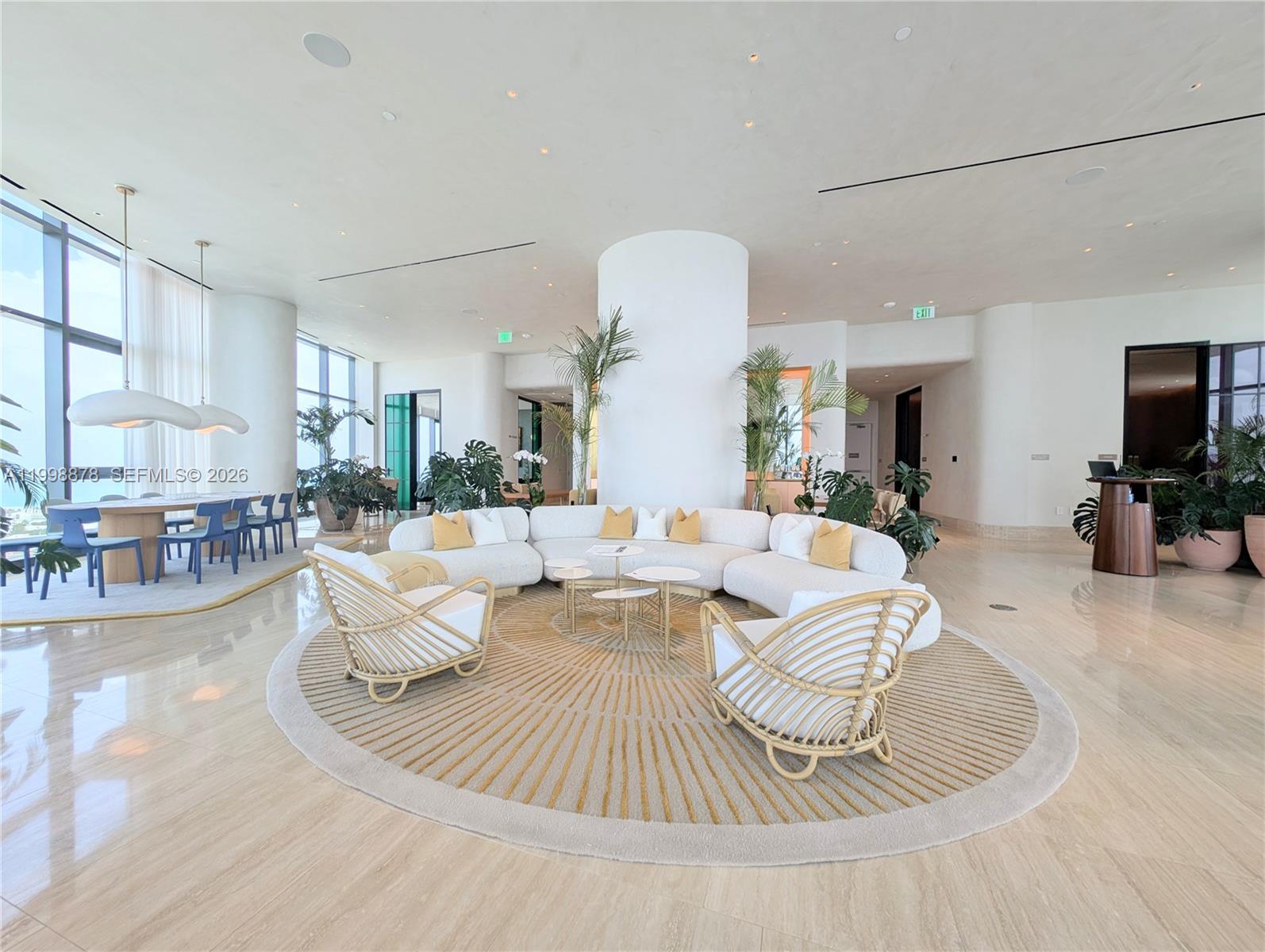 500 Alton Road, Unit 3905 Miami Beach, FL 33139 - Photo 23 of 27 a living room with furniture and a fireplace
