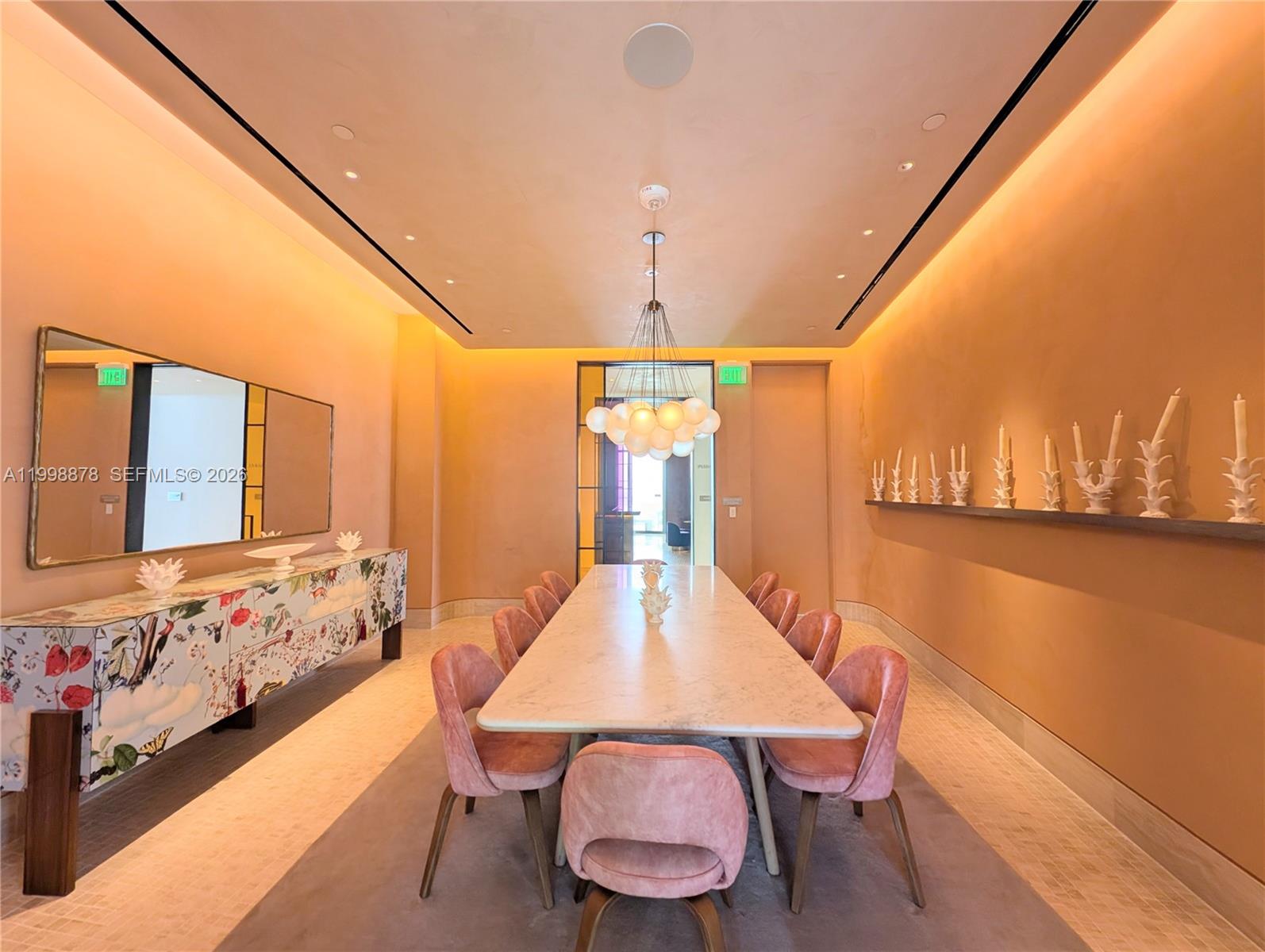 500 Alton Road, Unit 3905 Miami Beach, FL 33139 - Photo 27 of 27 a dining room with furniture and window