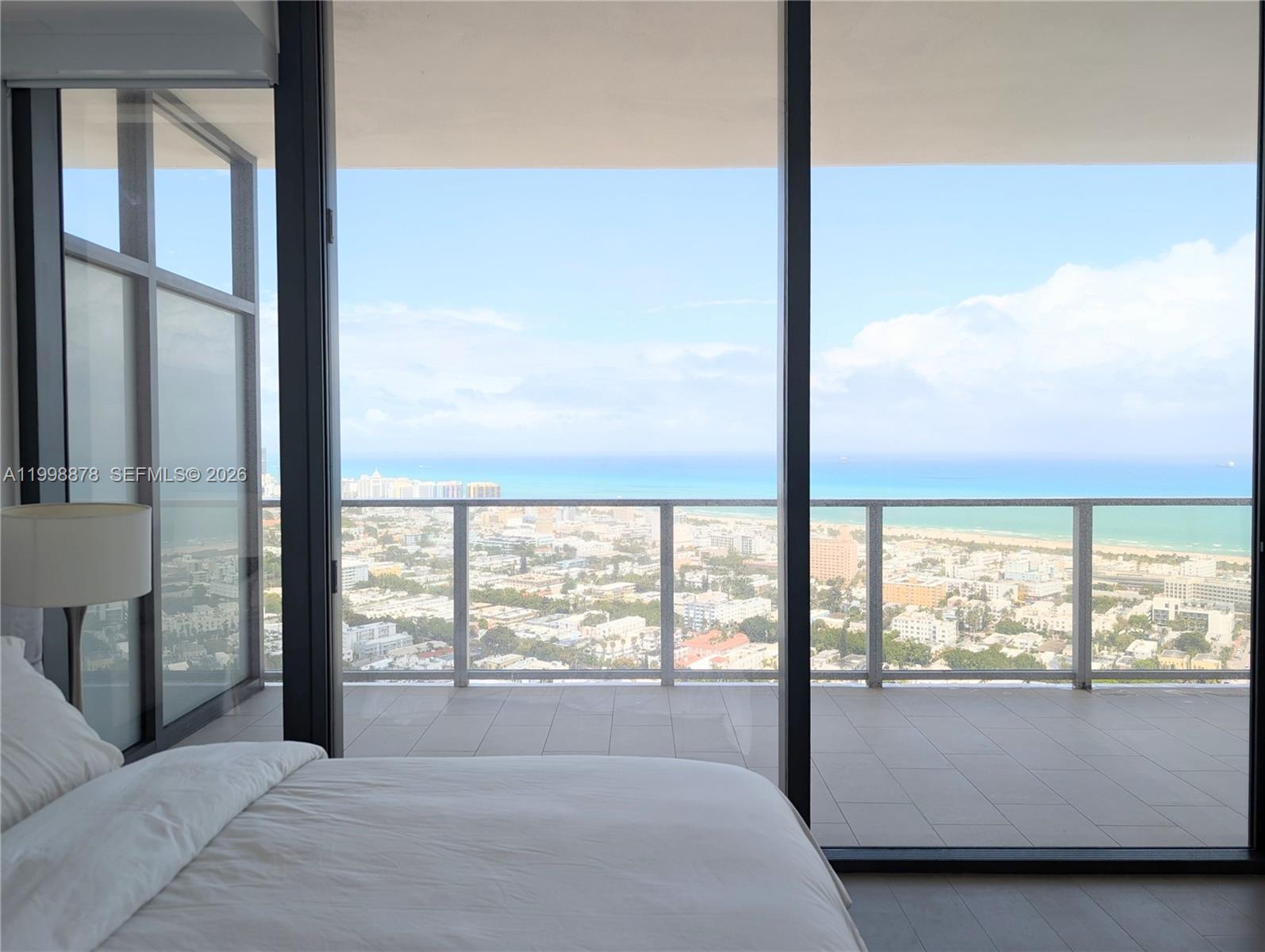 500 Alton Road, Unit 3905 Miami Beach, FL 33139 - Photo 4 of 27 a view of a room with window