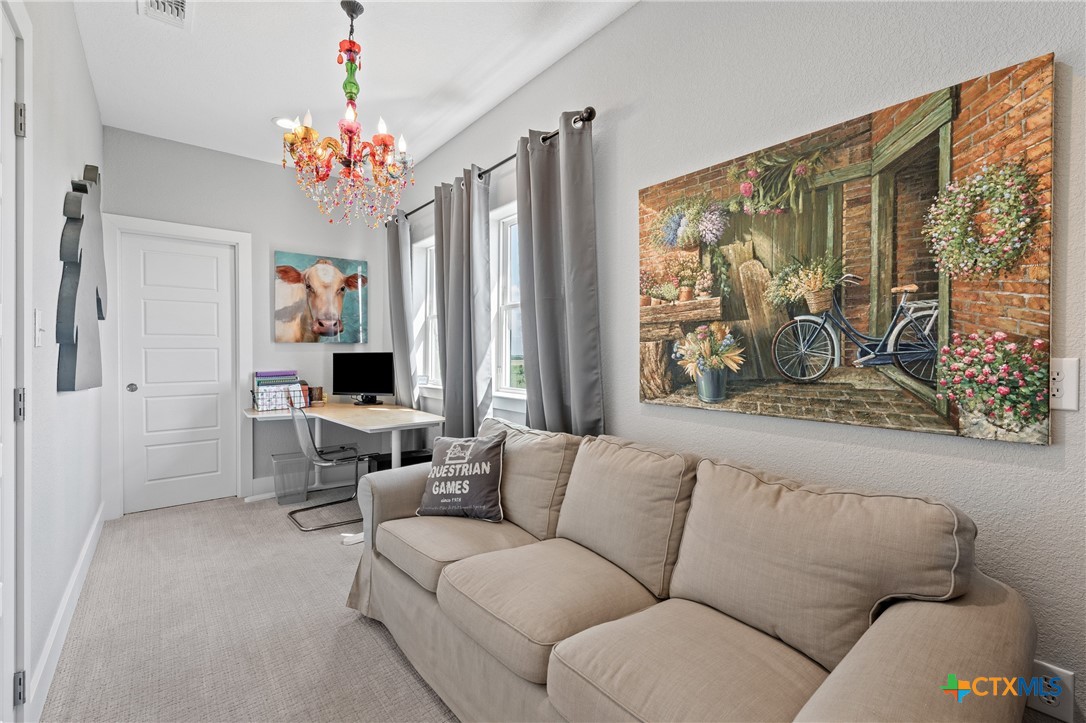 7351 Hackberry Road Holland, TX 76534 - Photo 20 of 41 a living room with furniture and a large window