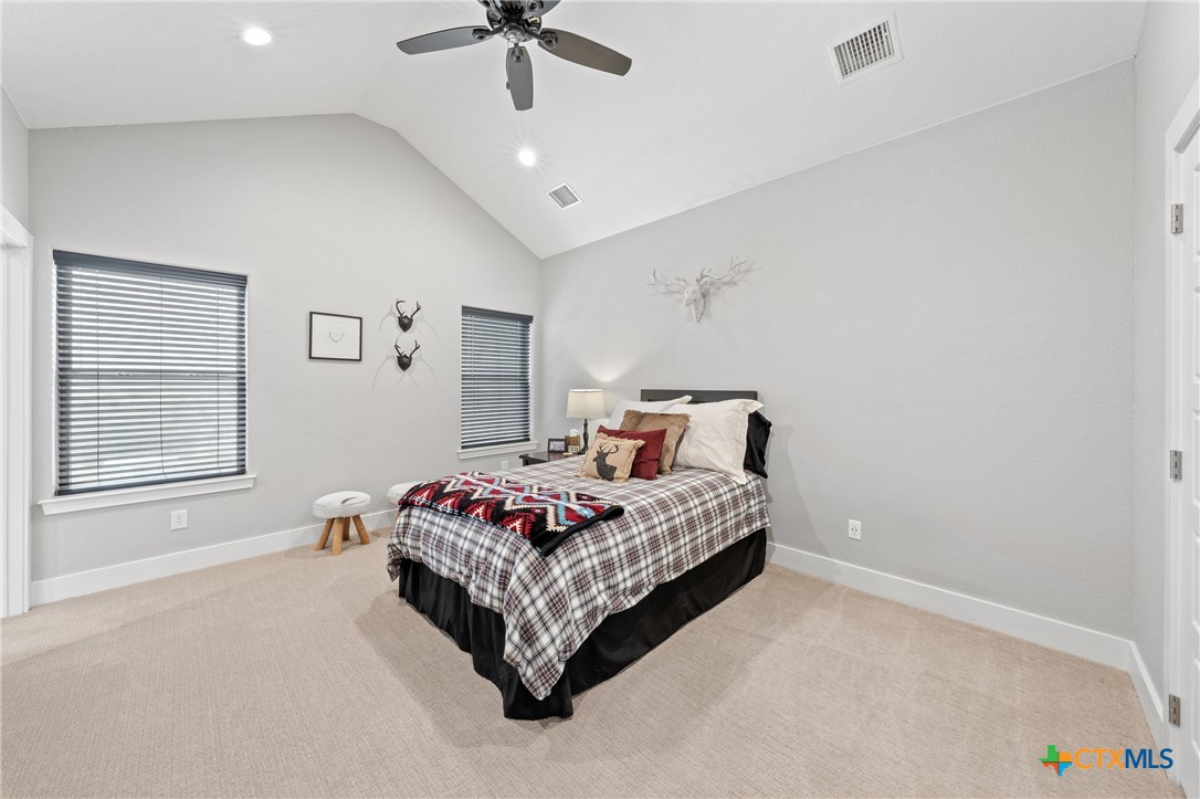 7351 Hackberry Road Holland, TX 76534 - Photo 22 of 41 a spacious bedroom with a bed and window