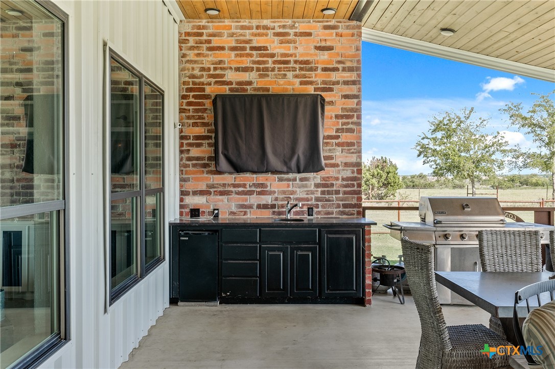 7351 Hackberry Road Holland, TX 76534 - Photo 32 of 41 a bathroom with a sink and a mirror