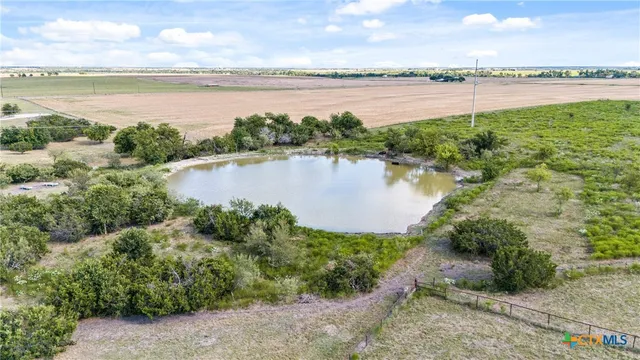 a view of a city and lake